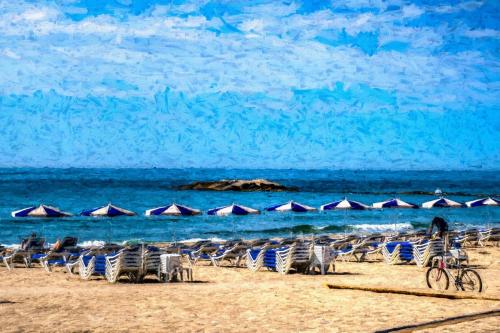 French Coastline, Holiday under Blue Umbrellas